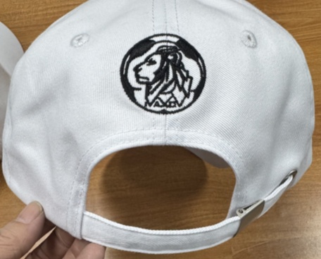 The cap is white I am a champion   2024.12